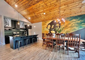 Open kitchen and dining space! Amazing art!