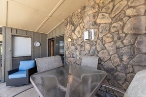 Private balcony with outdoor seating and breath taking mountain, lake and amphitheater views.