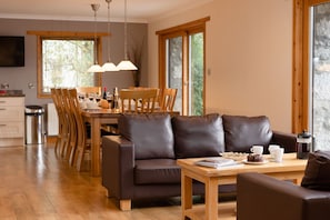 Black Grouse Lodge dining table and sofas