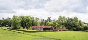 View of all barns in rural setting 