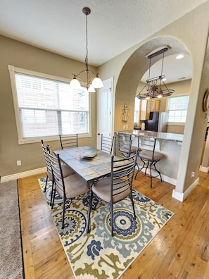 Enjoy gathering in this large dining area with all the comforts of home!