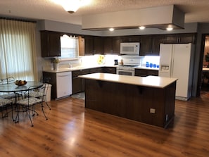 We’ll equipped kitchen and dining area, spacious for cooking and entertaining.