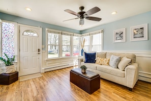 Living Room | Queen Sleeper Sofa | Electric Heating | Window A/C Units
