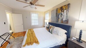 Main Bedroom with safe-rest mattress encasement and fresh white linens.