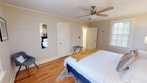 Main Bedroom with safe-rest mattress encasement and fresh white linens.