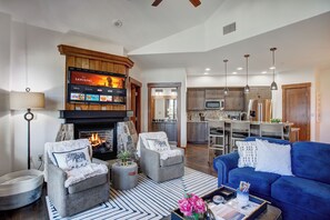 Enjoy the electric fireplace and stream your favorite movie with our Roku TV. 