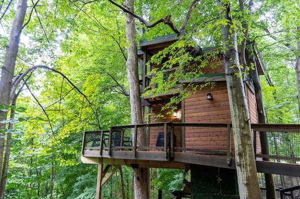 The Rustic Treehouse is your secluded getaway in the woods!!