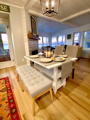 Four seat, dining room table.. 360 view of the water
