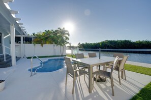 Fiberglass pool, dining table, beach chairs, and parking for boat included!