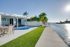 Fiberglass pool, dining table, beach chairs, and parking for boat included!