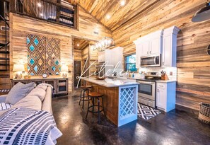 Feel the warmth of the wood and the joy of being together in this spacious area.
