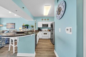  Kitchen includes toaster, coffeemaker, waffle iron, & blender. Dining for 6