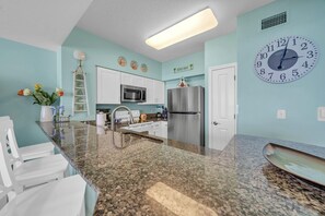 Kitchen views Gulf.  Lots of granite counter space.