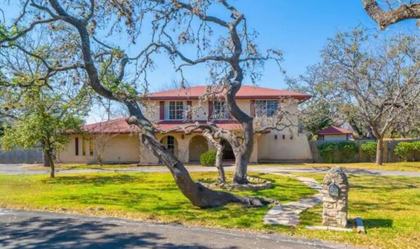 Front of House with native South Texas Live Oak