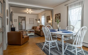 Bright dining room opens to living room