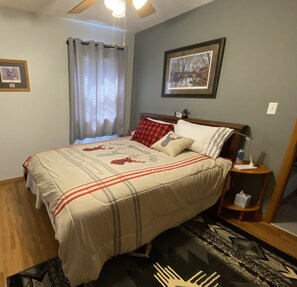 An amazingly comfy adjustable bed is in this lovely bedroom.