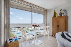 End of the living room is a cafe style table for 2 with lovely views of Siesta Key (no water view)