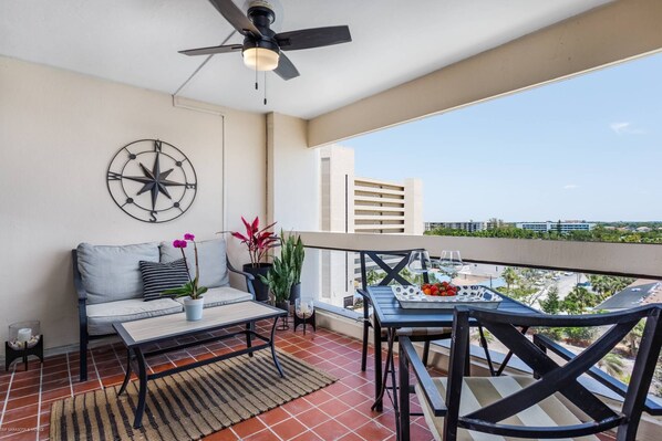 Relax on the open balcony with a glass of wine and a good book