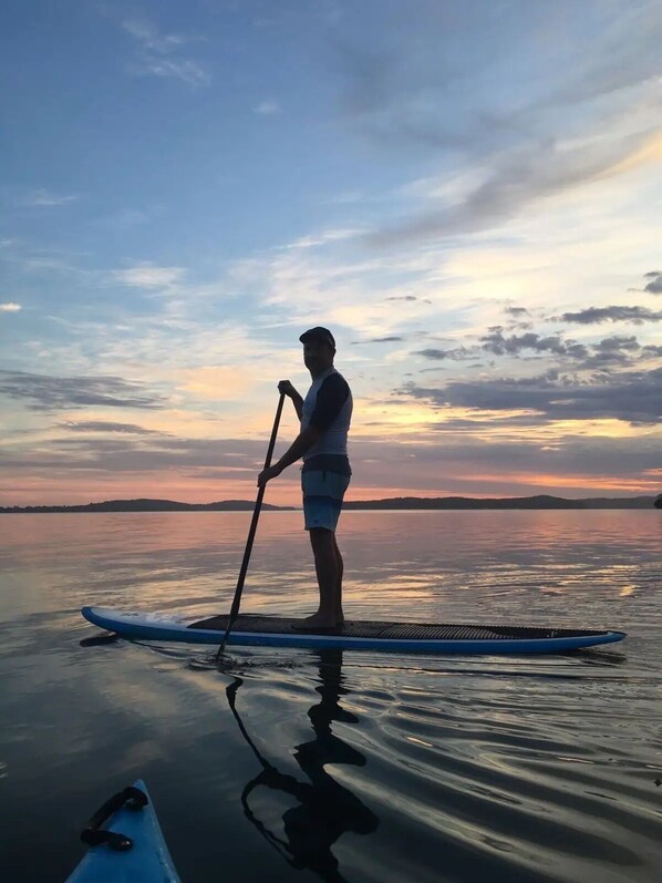 SUP paddle boarding from your waterfront location 