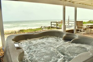 Dip into relaxation with a view that takes your breath away. Our oceanfront hot tub is the ultimate retreat, where the soothing waters meet the endless horizon