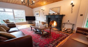 Four Pines Lodge living room and fireplace