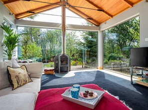 River House Garden Rooms view with wood burner