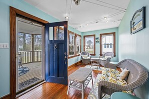 Gorgeous Sunroom lines the front of Starbright Cottage.