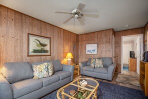 The comfy Living Room has Free WiFi, Satellite TV, and a Brand New Queen Sleeper Sofa.