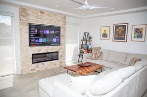 Fireplace with remote control. Changes color and if needed, can heat up the room