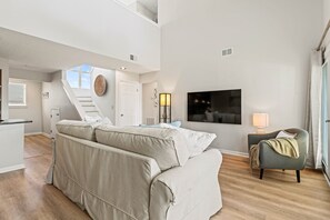 Living Room - Perfect for unwinding the coastal decor is just one of the many reason to cozy up with the family.