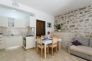 Living room with kitchen