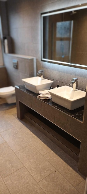 Double Sink Bathroom with heat and light mirror with extra storage