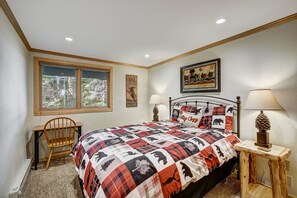 Rejuvenate in our spacious master bedroom with a comfortable queen-size bed.