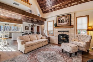 Great room flows to dining room and kitchen, light and bright.