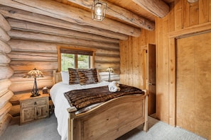 Step into our relaxing wooden bedroom, where nature harmoniously blends. 