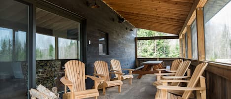 Spacious screened-in porch for relaxing