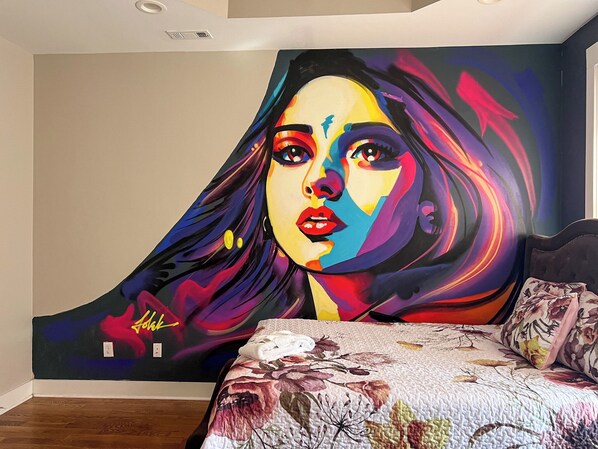 Custom Murals by Local Artist Folek Throughout