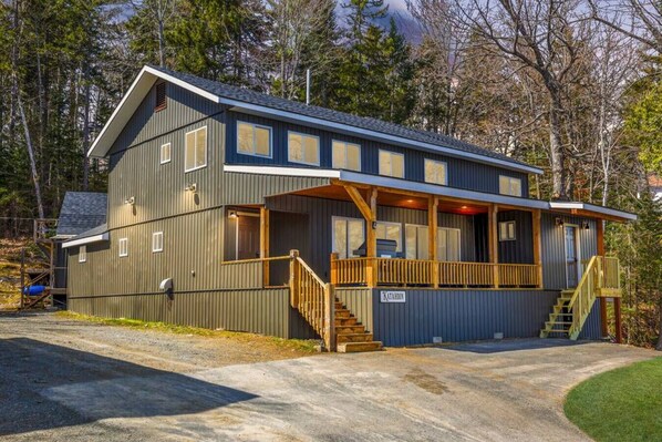 Explore the quaint details of our cabin's side view.