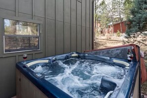 The hot tub invites you to unwind under the stars, or with your morning coffee.