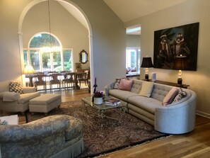 Spacious living room with natural light.