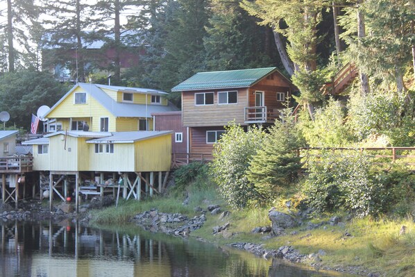 Your cabin is on the right with the green roof.