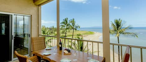 Enjoy a delicious beverage or meal while listening to the tropical birds and calm ocean waves