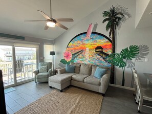Custom mural commissioned by a local artist, especially for this wall.