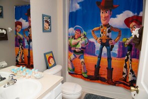 Twin over full Toy Story bunk room with attached bath