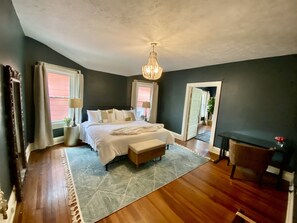 Plush, king bed. Black out curtains. Desk. Closet for hanging clothes