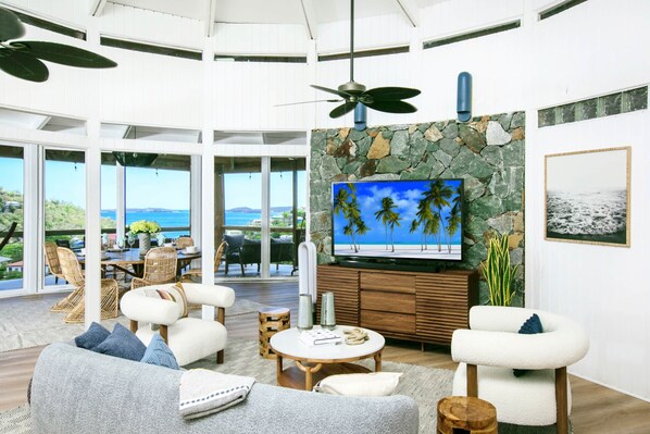 Bright, spacious living room with panoramic ocean views – relax in luxury. (1)