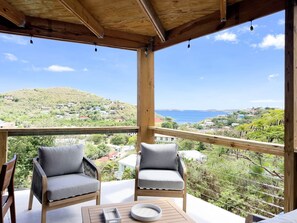 Enjoy breathtaking views from our cozy patio – your perfect spot to unwind.