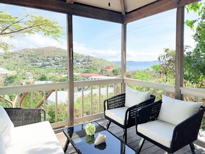 Enjoy breathtaking views from our cozy patio – your perfect spot to unwind. (1)