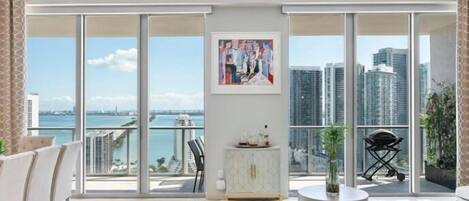 Double hight ceilings and unobstructed view of bay from downstairs