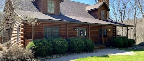 Front porch offers swing and additional seating for four.